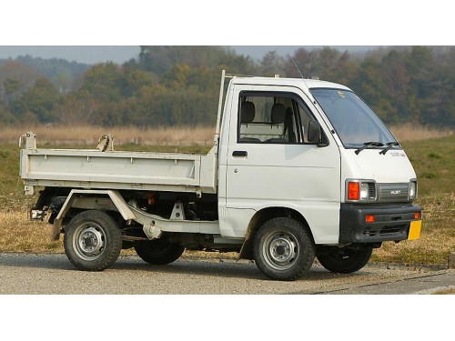 Характеристики грузового фургона Daihatsu Hijet Truck 660 Jumbo custom (08.1991 - 07.1992): фото, размеры, грузоподъемность, масса, скорость, двигатель, топливо, отзывы