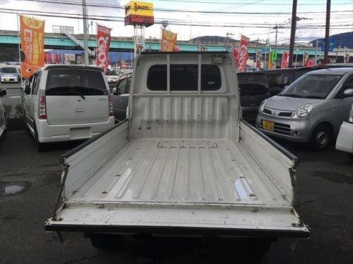 Характеристики грузового фургона Daihatsu Hijet Truck 660 Extra (01.1999 - 12.2000): фото, размеры, грузоподъемность, масса, скорость, двигатель, топливо, отзывы