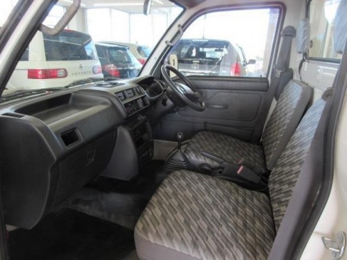Характеристики грузового фургона Daihatsu Hijet Truck 660 low dump (06.2003 - 11.2004): фото, размеры, грузоподъемность, масса, скорость, двигатель, топливо, отзывы