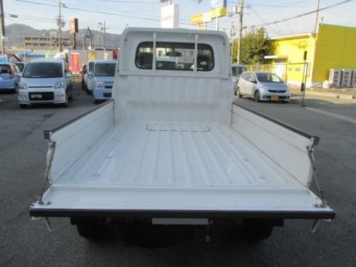 Характеристики грузового автомобиля Daihatsu Hijet Truck 660 Jumbo 3-way (08.2010 - 08.2014): фото, грузоподъемность, масса, скорость, двигатель, топливо, отзывы
