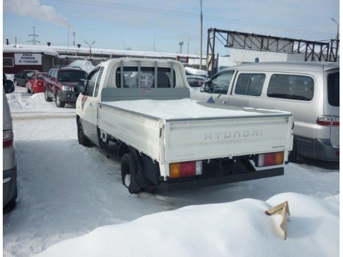 Характеристики грузового автомобиля Hyundai Libero 3.0 LPG MT General Cap (03.2000 - 12.2007): фото, грузоподъемность, масса, скорость, двигатель, топливо, отзывы