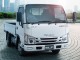 Характеристики грузового автомобиля Isuzu Elf 3.0 Double Cab Standard Cabin Standard Body Full Flat Low 2t ST (03.2021 - н.в.): фото, грузоподъемность, масса, скорость, двигатель, топливо, отзывы