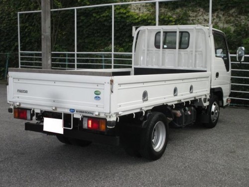 Характеристики грузового автомобиля Mazda Titan 3.0 Single Cab Middle Cabin Long Body Full Wide Low 2t Custom (06.2011 - 10.2014): фото, грузоподъемность, масса, скорость, двигатель, топливо, отзывы