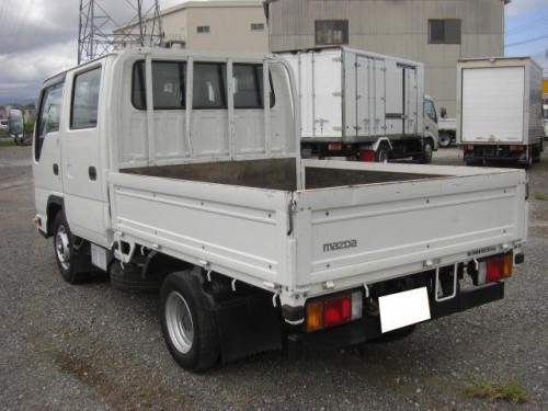 Характеристики грузового автомобиля Mazda Titan 3.0 Double Cab Wide Cabin Super Long Body Raised Floor 2.75t Standard (06.2011 - 10.2014): фото, грузоподъемность, масса, скорость, двигатель, топливо, отзывы