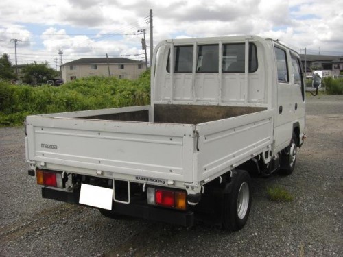 Характеристики грузового автомобиля Mazda Titan 3.0 Reinforced Dump Standard Cabin Standard Body Full Wide Low 2t Deluxe 4WD (01.2007 - 05.2011): фото, грузоподъемность, масса, скорость, двигатель, топливо, отзывы