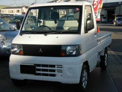 Характеристики грузового фургона Mitsubishi Minicab 660 easy floor dump (11.2000 - 12.2001): фото, размеры, грузоподъемность, масса, скорость, двигатель, топливо, отзывы