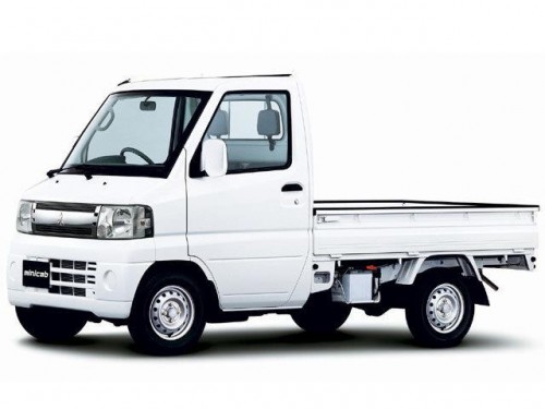 Характеристики бортового грузовика Mitsubishi Minicab 660 easy floor dump 4WD (08.2010 - 11.2011): фото, грузоподъемность, масса, скорость, двигатель, топливо, отзывы