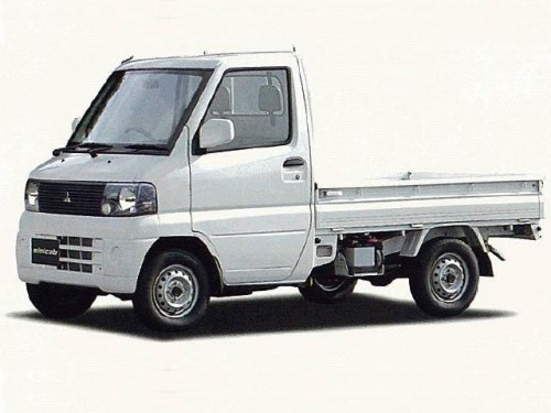 Характеристики грузового фургона Mitsubishi Minicab 660 easy floor dump (01.2002 - 07.2002): фото, размеры, грузоподъемность, масса, скорость, двигатель, топливо, отзывы