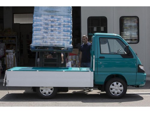 Характеристики бортового грузовика Piaggio Porter 1.3 MT Eco-Power Extra 1.5t long deck (11.2015 - н.в.): фото, грузоподъемность, масса, скорость, двигатель, топливо, отзывы