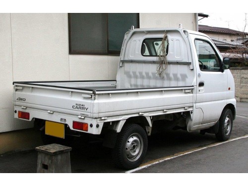 Характеристики бортового грузовика Suzuki Carry Truck 660 4WD (11.1999 - 04.2000): фото, грузоподъемность, масса, скорость, двигатель, топливо, отзывы